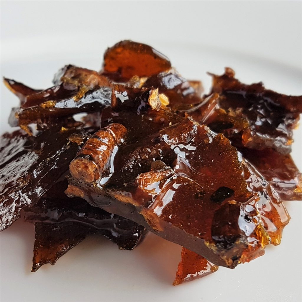 Chunky pieces of dandelion root caramel brittle