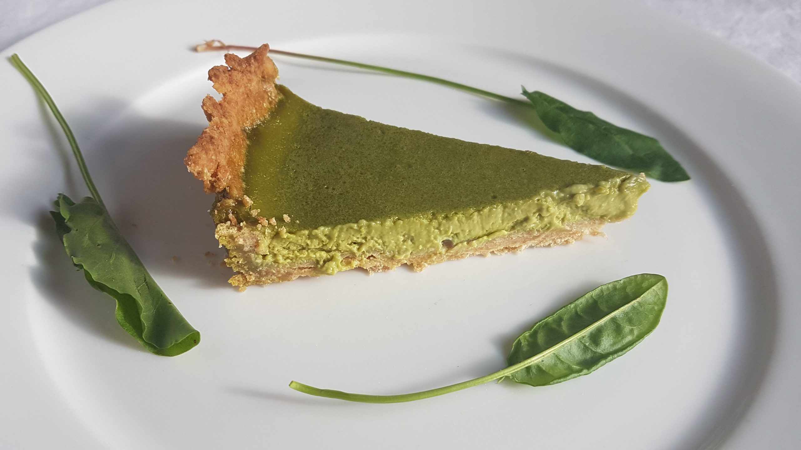 Sorrel tart with wild leaves picked on a foraging course in Cornwall