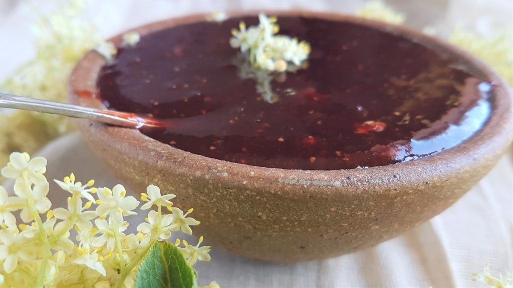 Bowl of strawberry and elderflower jam