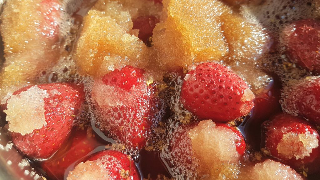 Infused strawberries, sugar and elderflowers