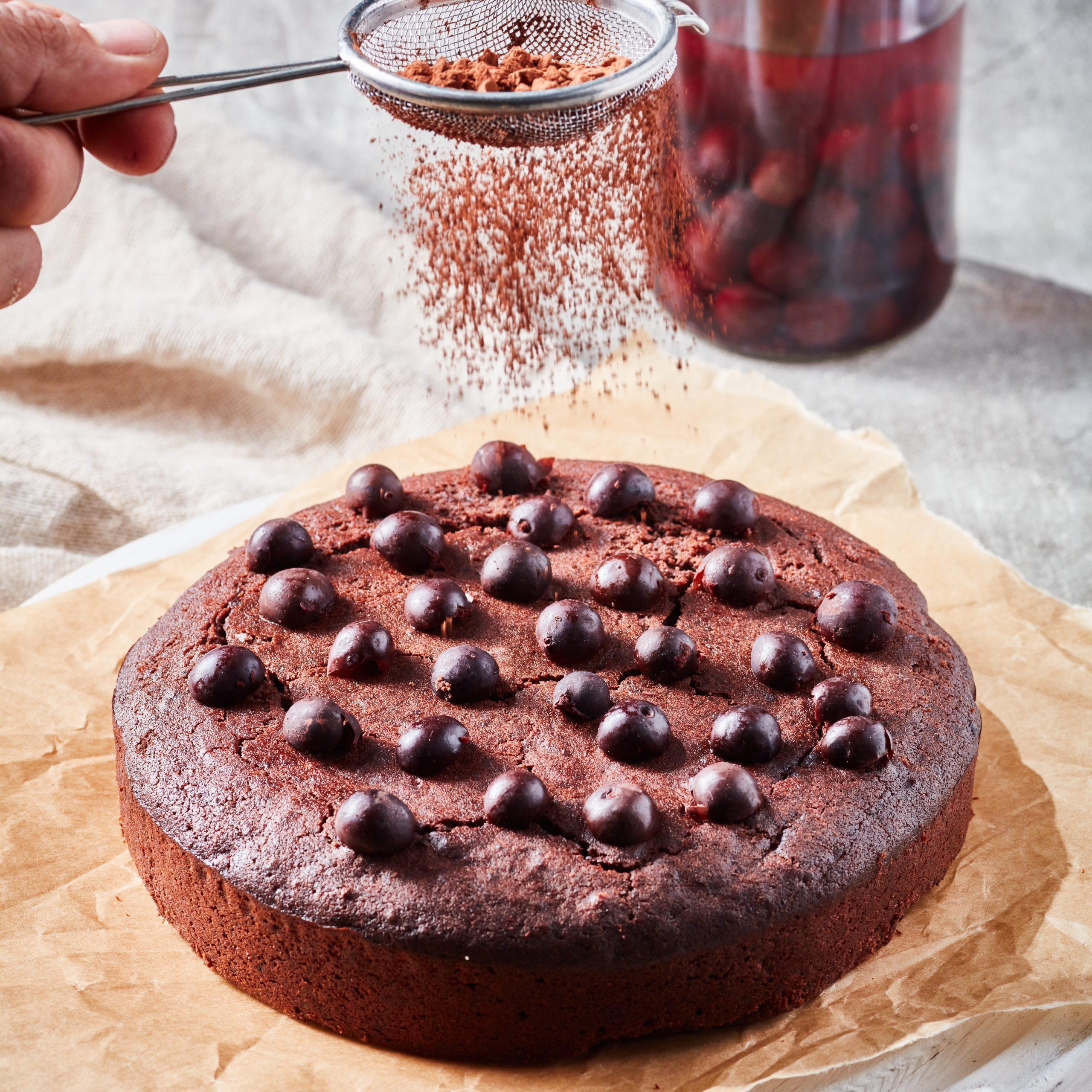 Chocolate cake decorated with gin soaked sloes