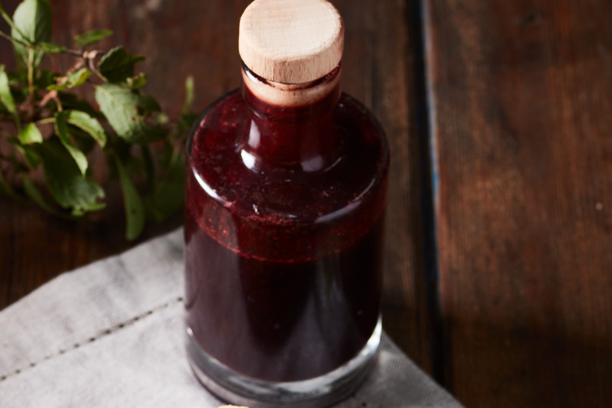 Bottle of homemade sloe syrup